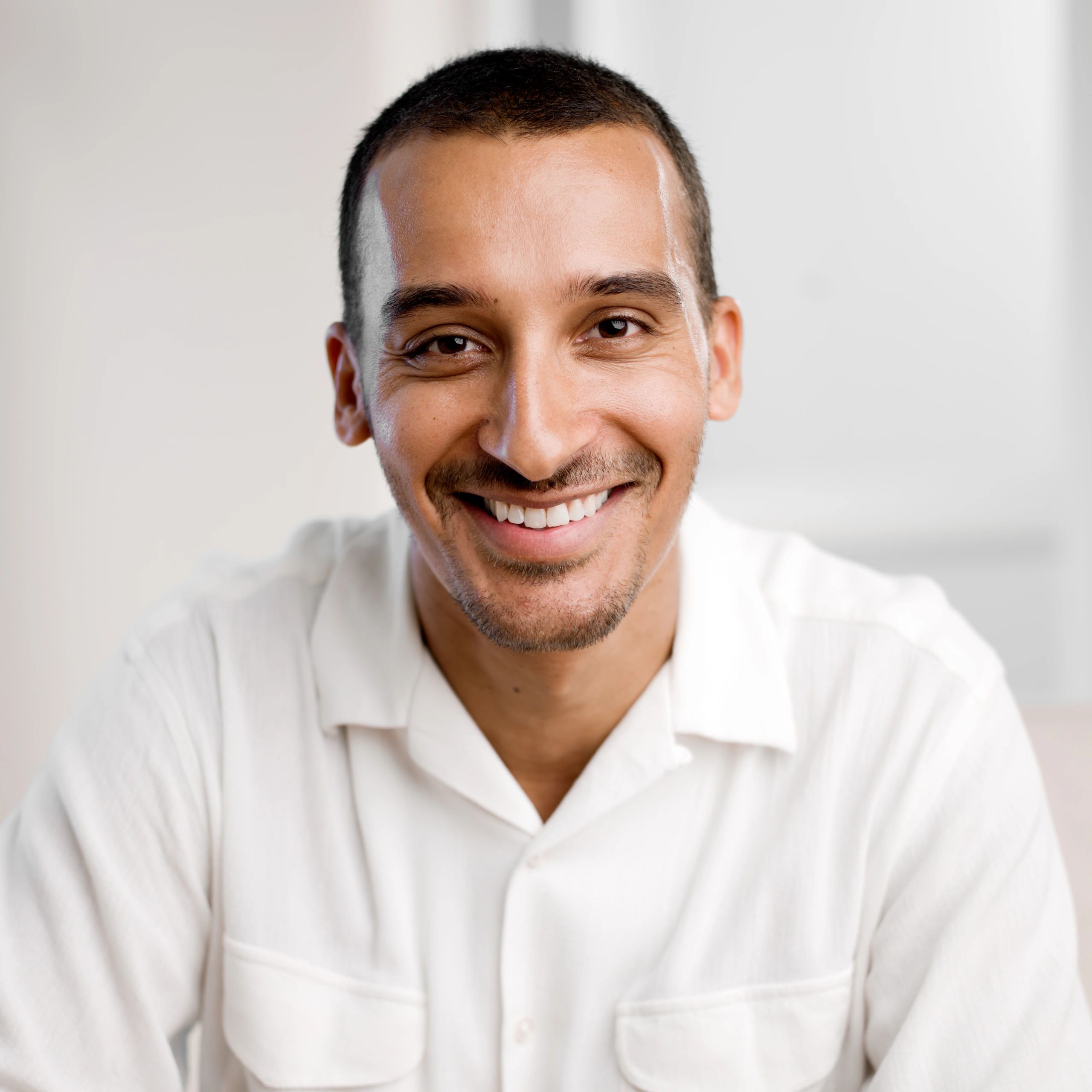 Portrait headshot of Sam Patel