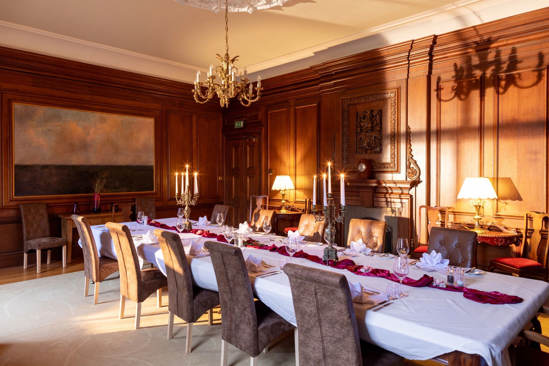 Modern table setting with glassware and candles